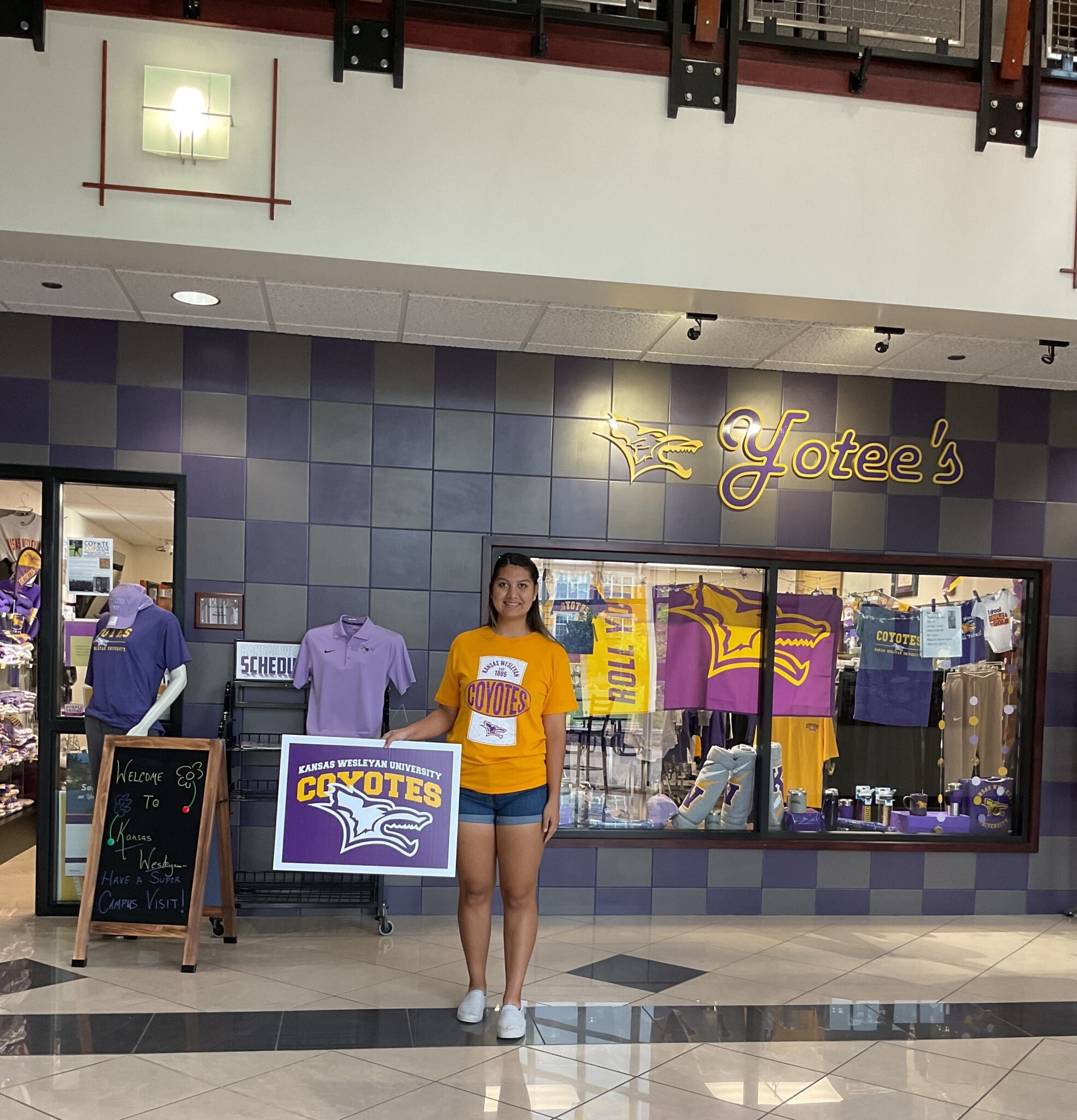 a group of people walking in front of a store