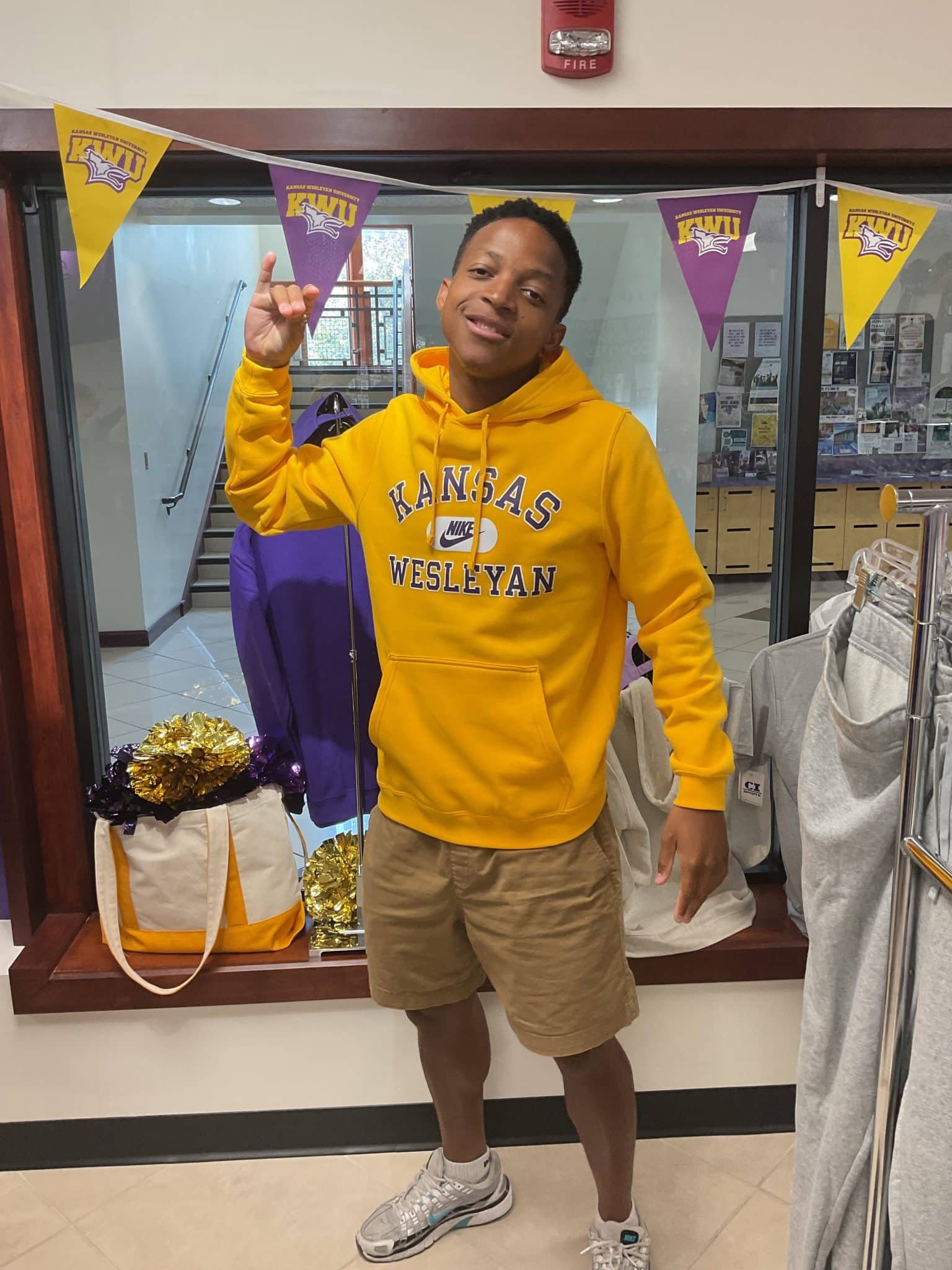 a man standing in front of a store