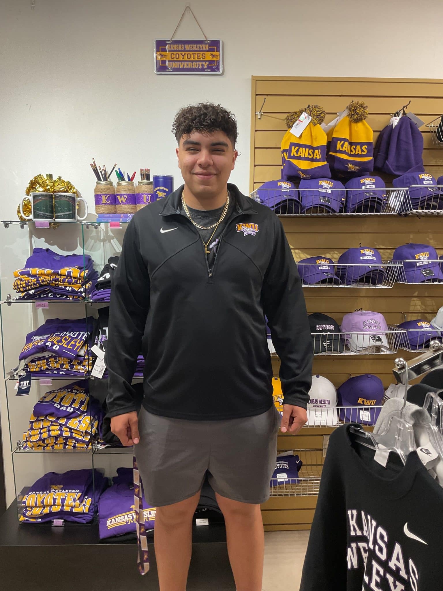 a person standing in front of a store